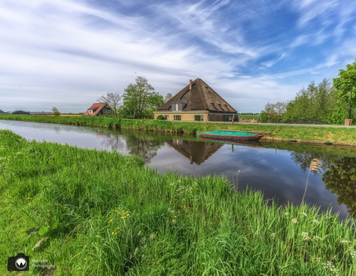 Boerderij aan het water
